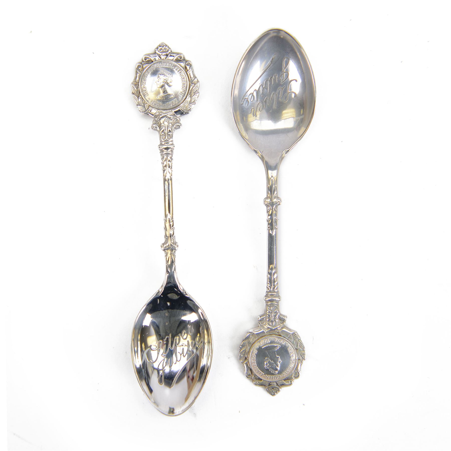 Group of silver, comprising two rectangular photograph frames, two pencil holders, boxed spoon and souvenir spoons, all hallmarked 