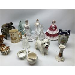 Three Coalport figures, comprising of Eugenie, Lillie Langtry and Daphne together with Royal doulton figure Joy, a German Majolica canon decanter and other ceramics and glassware
