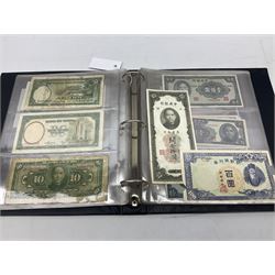 World banknotes, including Queen Elizabeth II The States of Jersey one pound 'DB202703', five pounds 'BB527762' and ten pounds 'AB651481', reserve bank of New Zealand two dollars '1L3 741894', King George V Straits Settlements one dollar 1st January 1935 'F/83 28924', various Bank of England notes etc, housed in two ring binder albums