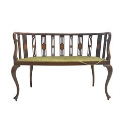 Edwardian inlaid mahogany salon settee or bench, the pierced and inlaid splat back over serpentine front, seat upholstered in laurel green velvet, raised on cabriole supports with satinwood stringing