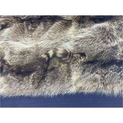 Taxidermy: Racoon (Procyon lotor), large wool backed patchwork carriage/car rug, constructed from fifteen racoon pelts, H130cm L175cm