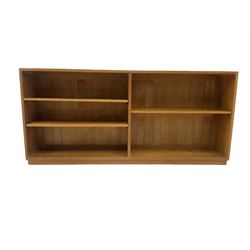 Light oak low two sectional open bookcase fitted with adjustable shelves