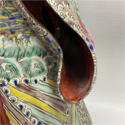 Chinese Republic Period porcelain figure, modelled as Shoulao, wearing elaborately enamelled robes decorated with peaches and flower heads, with impressed mark beneath, H55cm