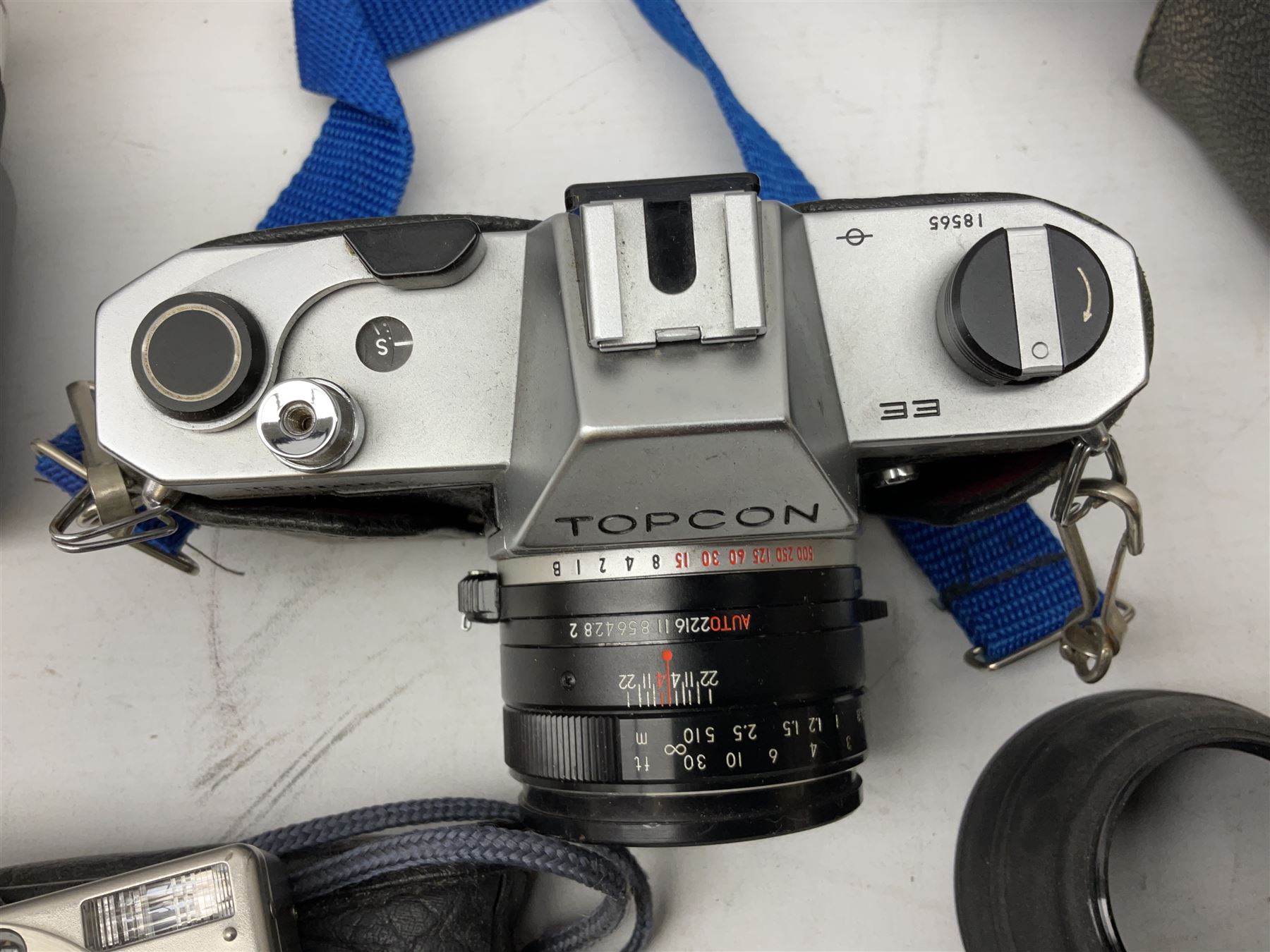 Quantity of cameras and lenses to include Topcon Unirex camera etc with cases