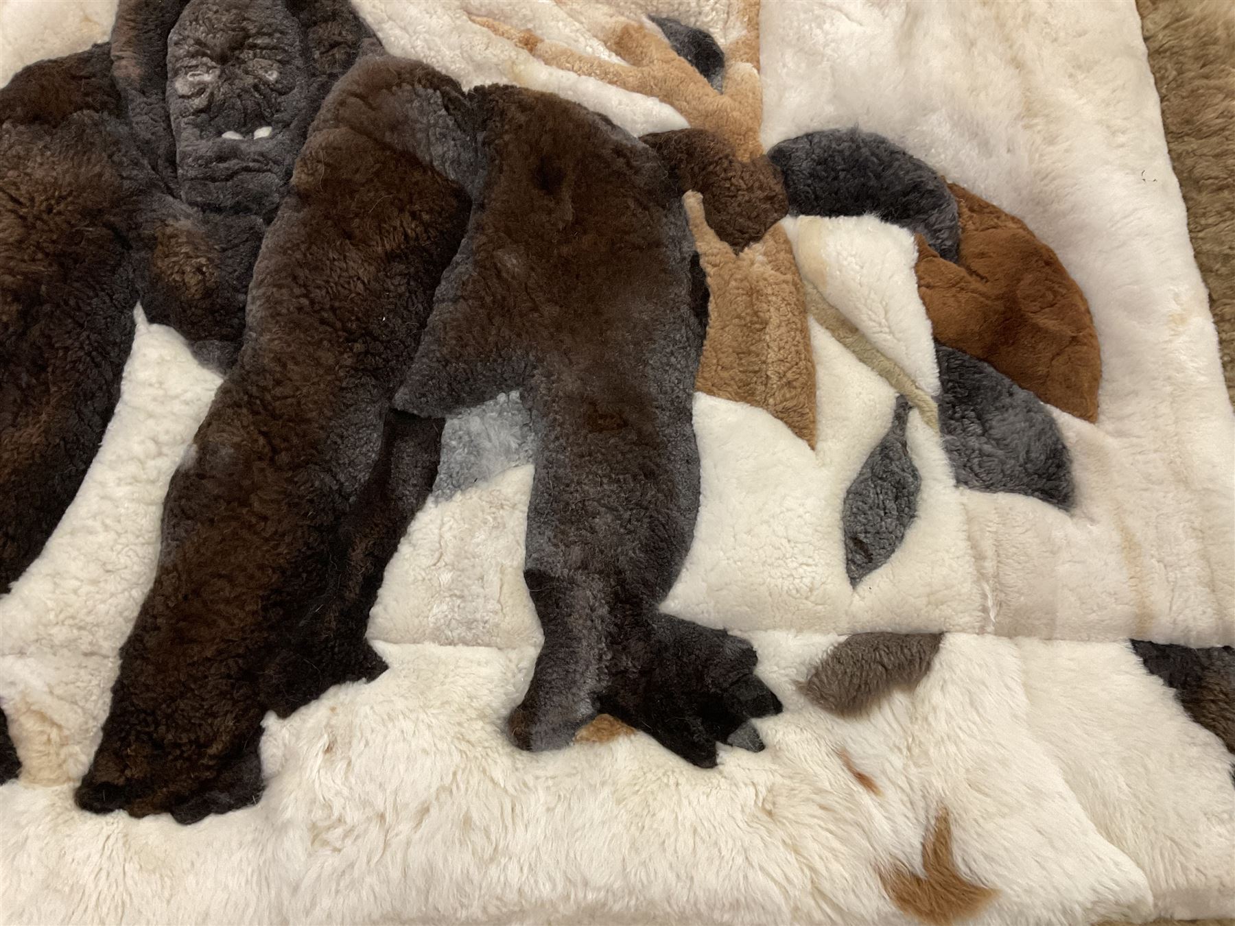 Alpaca rug/wall hanging depicting a gorilla on a cream background 