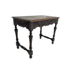 Late 19th century ecclesiastical oak side table, rectangular top witt lunette carved border and moulded edge, frieze carved with fleur-de-lis decoration and shaped apron, raised on turned supports united by stretcher