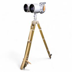 Pair of mid 20th century Russian Helios PNB-2 military observation binoculars, no. 40149, each 'Big Eye' lens 13cm in diameter, with 80 degrees vertical elevation, 360 degrees rotation, spirit level to centre of body, contained in wooden stow case with service manual, canvas cover, two lens caps, a small latched metal tin containing lenses and accessories and on adjustable wooden tripod painted green with pointed feet,  with a small latched metal tin containing eight lenses and accessories