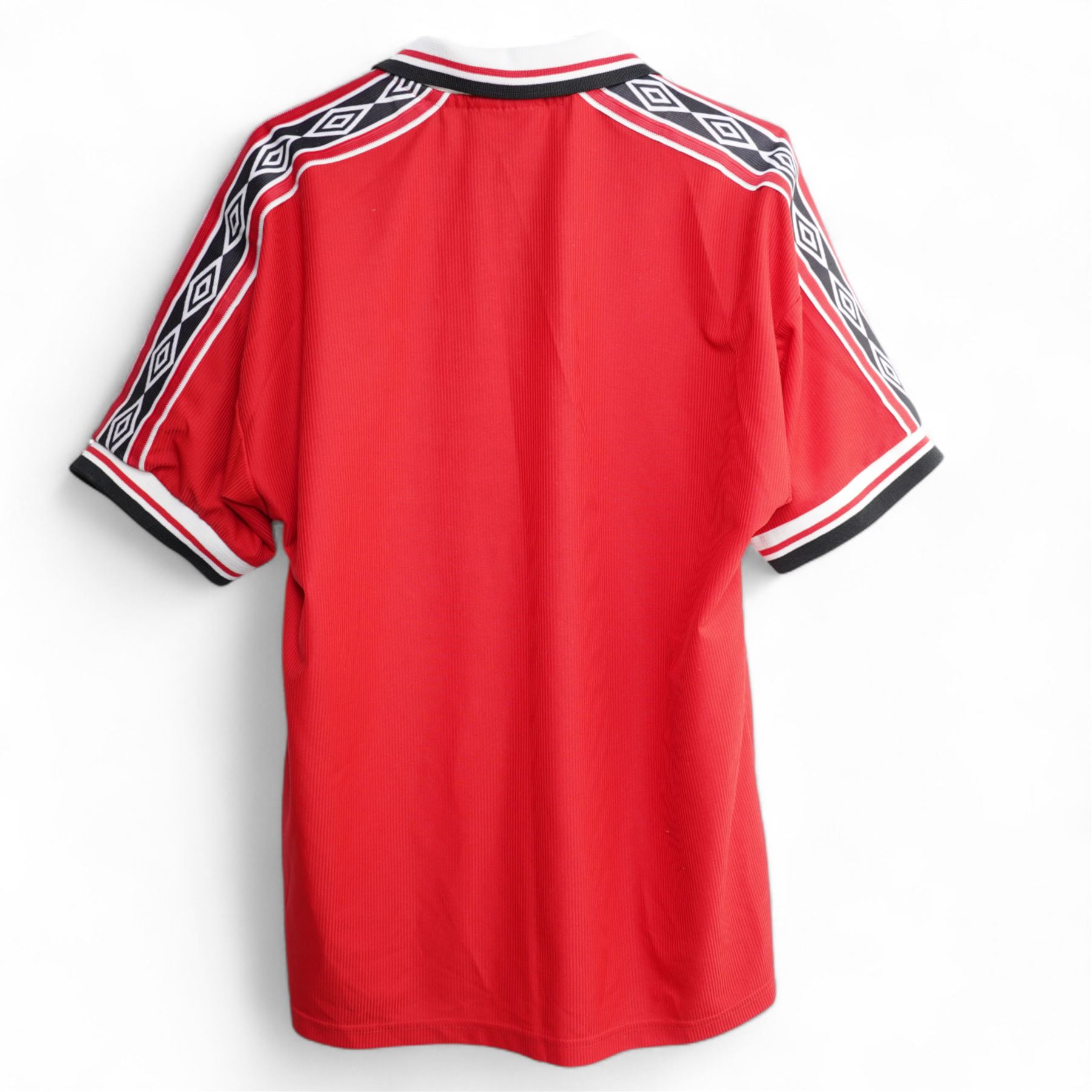 Manchester United 1998/99 treble winning squad Umbro shirt with signatures in silver pen and with certificate