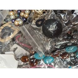 Large collection of costume jewellery, including beaded necklaces, bracelets, earrings, etc, some with silver clasps