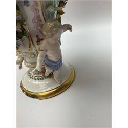 Meissen potpourri vase and cover, for restoration, of baluster form decorated with hand painted panel of a courting couple, and panel of a floral spray, further detailed with hand painted sprigs and encrusted flowers, flanked by two putti, with blue crossed swords mark beneath, H25cm, together with a Dresden teacup and saucer, decorated with alternating panels of courting figures, and floral sprays against a yellow ground, with mark beneath, teacup H6.5cm