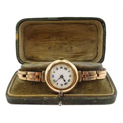 Early 20th century 9ct gold ladies wristwatch, London 1918, on rose gold expanding link bracelet, stamped 9ct, boxed