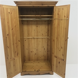 Solid pine double wardrobe, projecting cornice, two doors enclosing fitted interior, shaped plinth base, W99cm, H191cm, D60cm