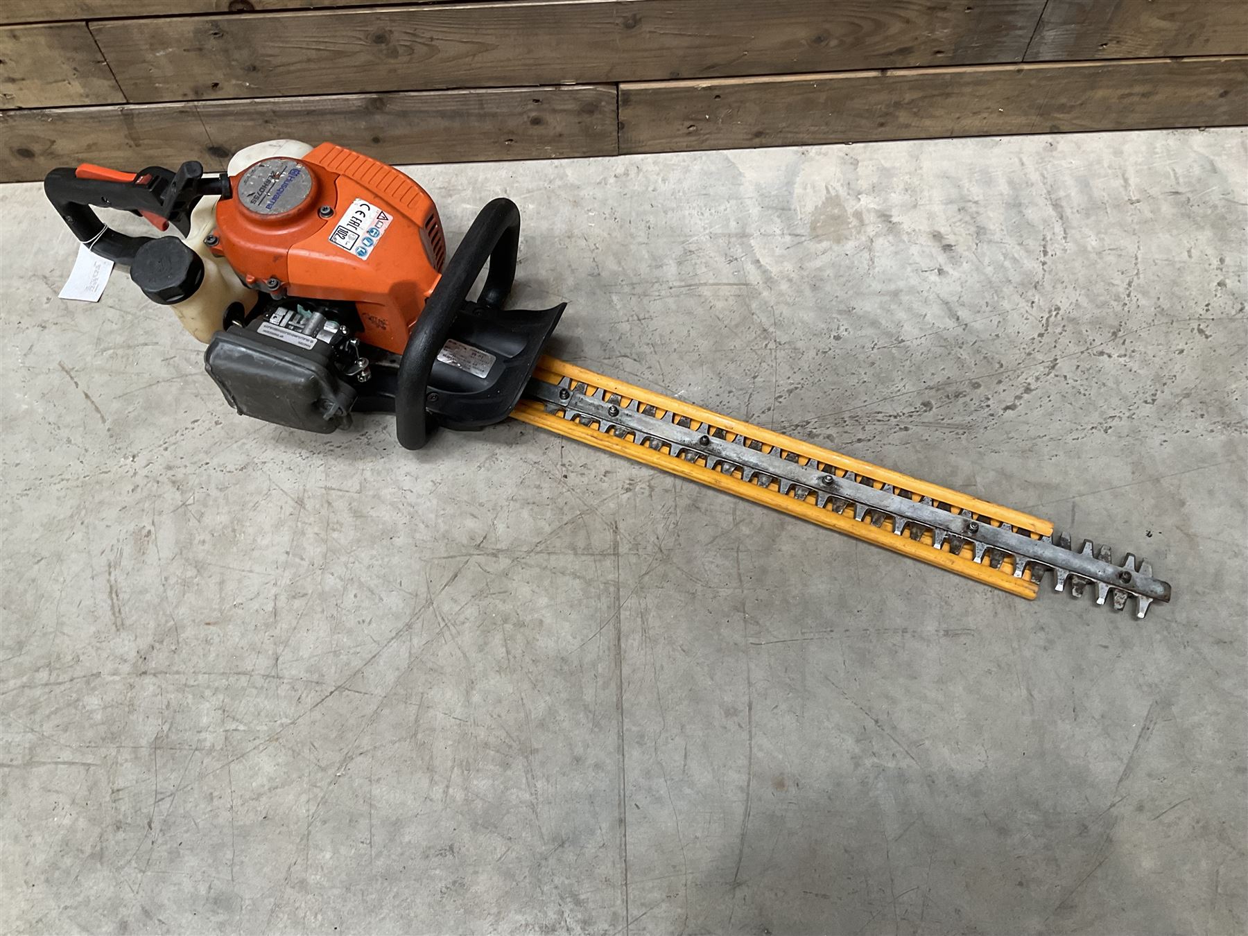 Husqvarna 141 petrol chainsaw and a Husqvarna 226HD75S petrol hedge cutter