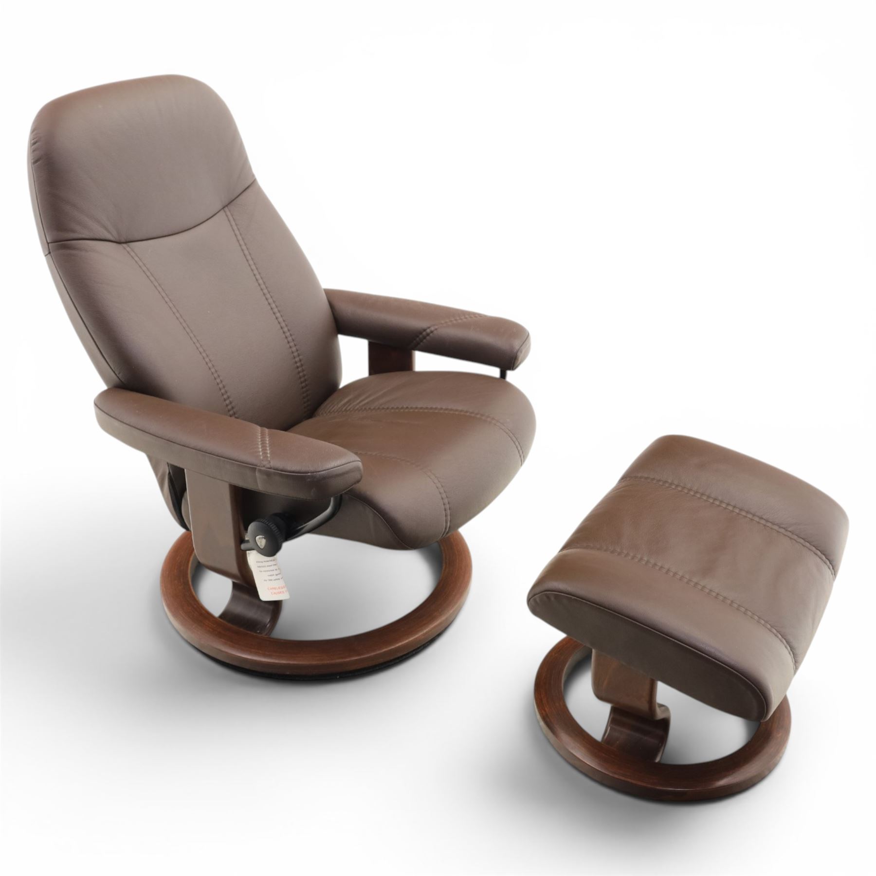 Ekornes - Stressless small brown leather recliner swiveling armchair and stool, brown leather recline with stitching, together with a matching stool, on a round base