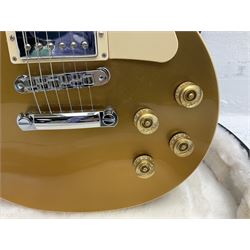 2011 Gibson Les Paul Traditional gold top electric guitar; serial number 103110461; with  mahogany back, twenty-two frets, 57 Classic humbuckers and bridge/stop bar tailpiece L100cm; in Gibson hardcase with owners manual and associated paperwork