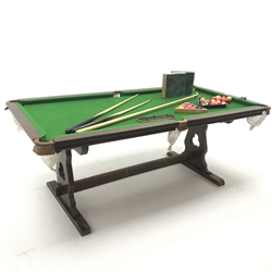 Mid to late 20th century oak pool table on shaped end supports joined by stretcher (W195cm, H72cm, D104cm) and accessories 