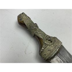 Saudi Arabian khanjar dagger with 29.5cm curving double edged  steel blade; white metal and copper mounted horn grip; in white metal mounted brass and leather scabbard incorporating embroidered leather wearing strap