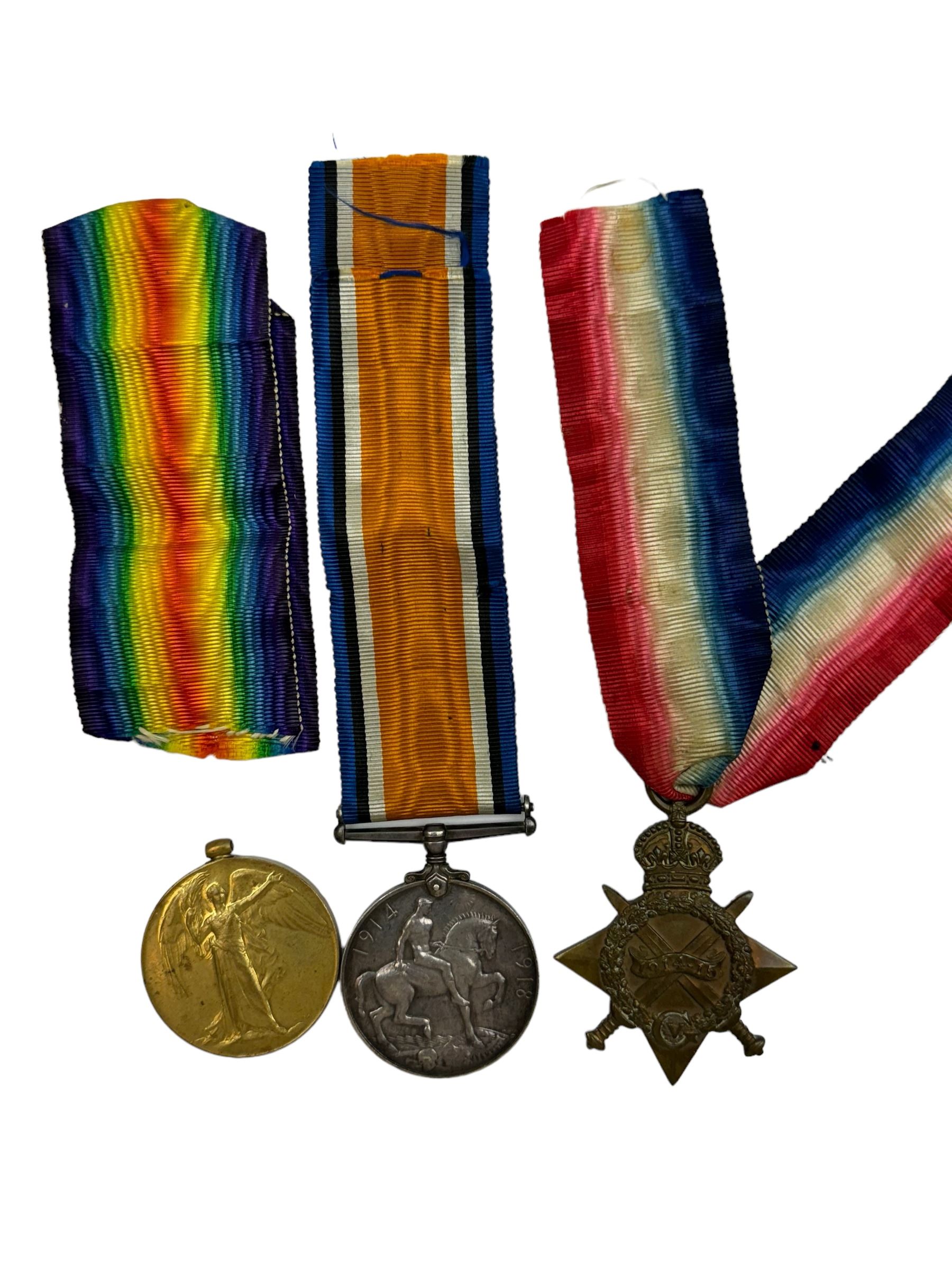 Three WWI medals, comprising 1914-15 Star, British War Medal and Victory Medal awarded to 3078 Private A.E Shone Durham Light Infantry