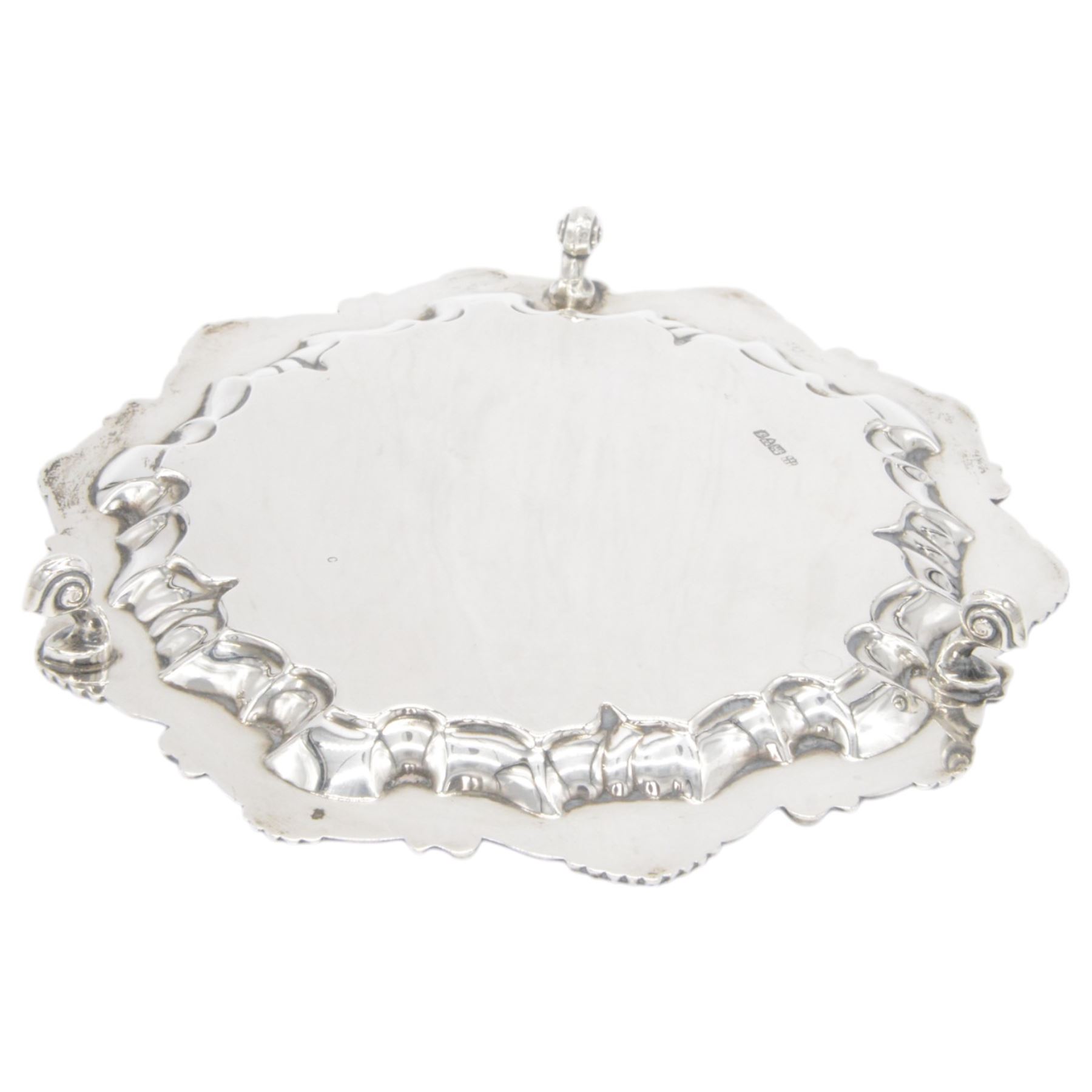 Edwardian silver waiter, of typical form with palmette and C scroll rim, upon three scroll feet, hallmarked Chester 1909, maker's mark MEB over FEB, W23cm