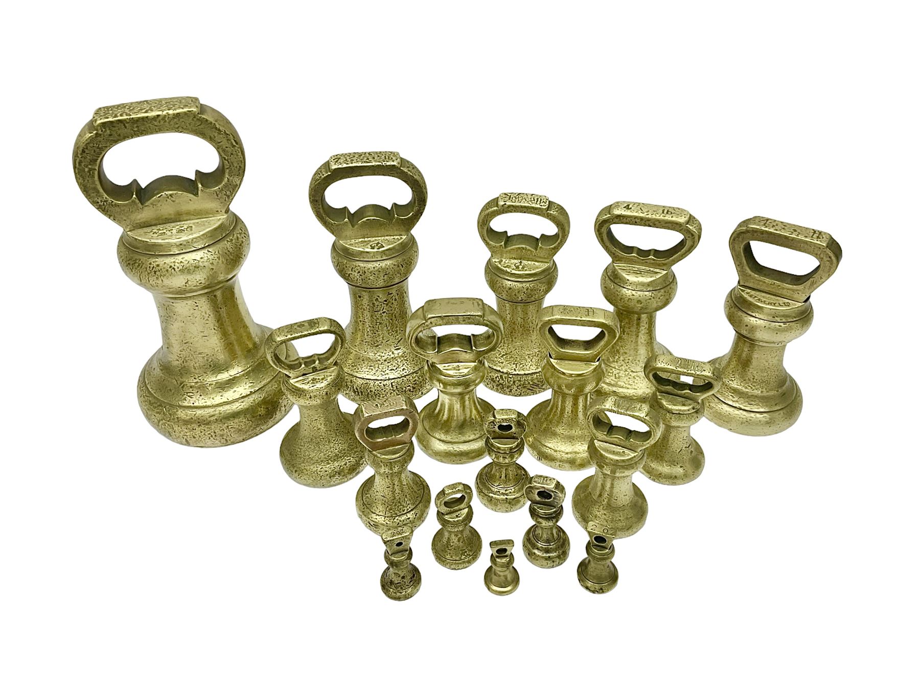 Set of seventeen Victorian brass bell weights