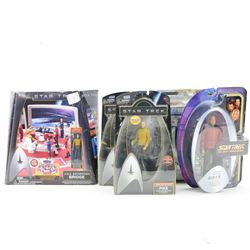 Three Art Asylum Star Trek action figure