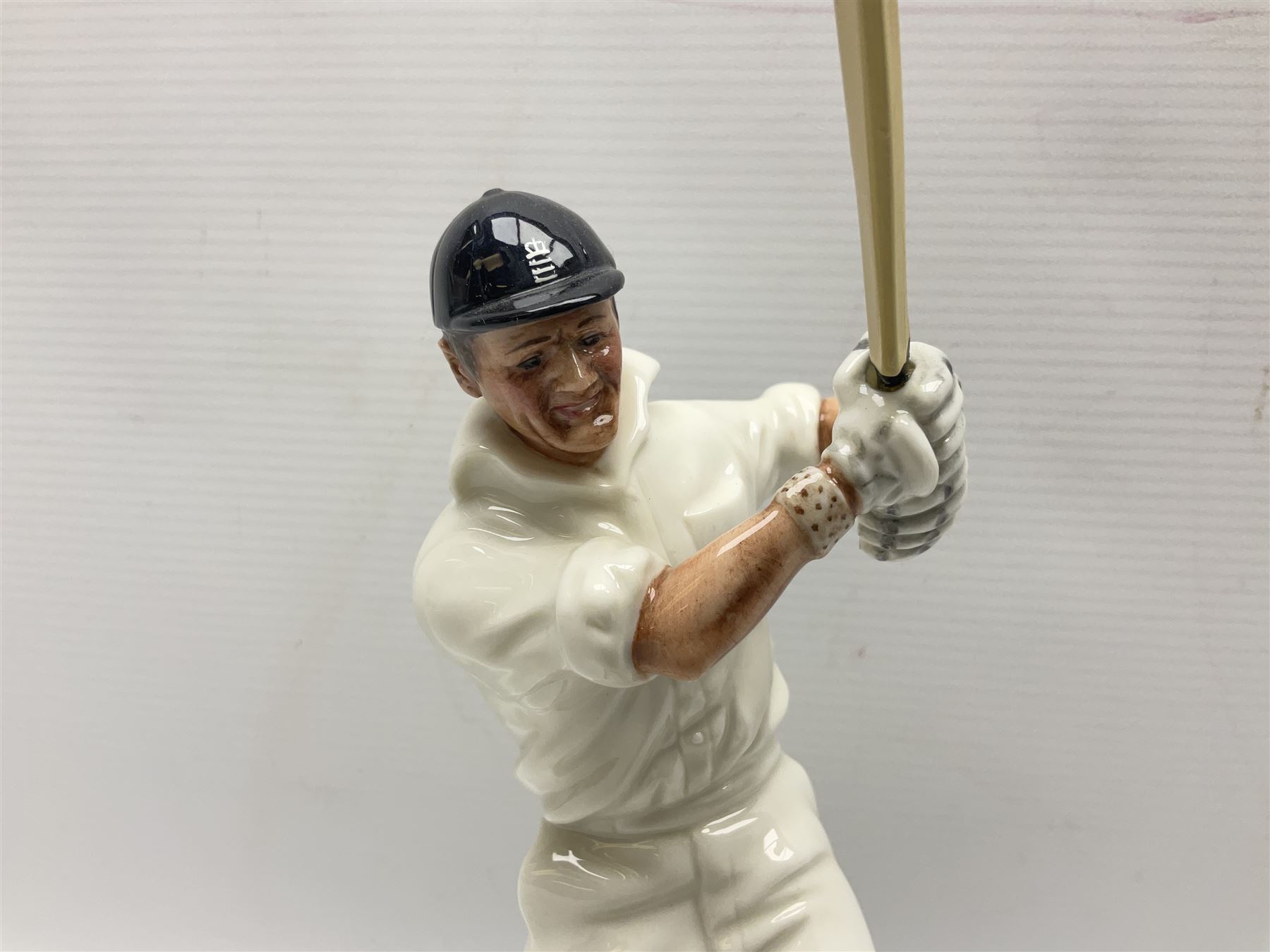 Royal Doulton limited edition figure of Geoffrey Boycott O.B.E, HN3890, no 253/8114, together with four Royal Doulton limited edition character jugs of cricket interest, comprising The Hampshire Cricketer D 6739, no 3903/5000, Freddie Trueman O.B.E, D 7090, no 502/9500, Brian Johnners Johnston, D 7018, no 1281/9500 and Len Hutton D 6945 no 263/9500, four with certificates, one with box