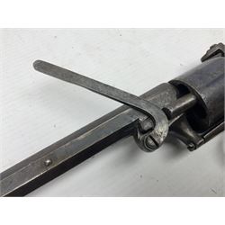 Mid-19th century Smith London .36 cal. transitional five-shot percussion revolver, the 12cm rifled octagonal barrel with side loading lever, side safety, some engraved decoration and chequered two-piece grip L28cm overall