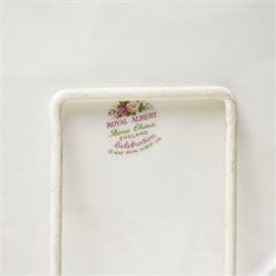 Royal Albert Celebration pattern tea and dinner wares, comprising covered tea and coffee pot, seven dinner plates, oval serving dish, gravy boat and saucer, nine coffee cups and ten coffee cup saucers, seven teacups and eight teacup saucers, eight soup bowls and saucers, rectangular serving tray, ten side plates, etc, approximately 88 pieces in total