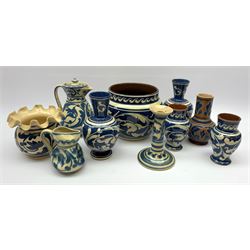 South Devon slip glazed pottery comprising: Aller Vale pottery bottle vase, Aller Vale candlestick, Exeter vase, jardinière, hot water pot and other similar pieces 
