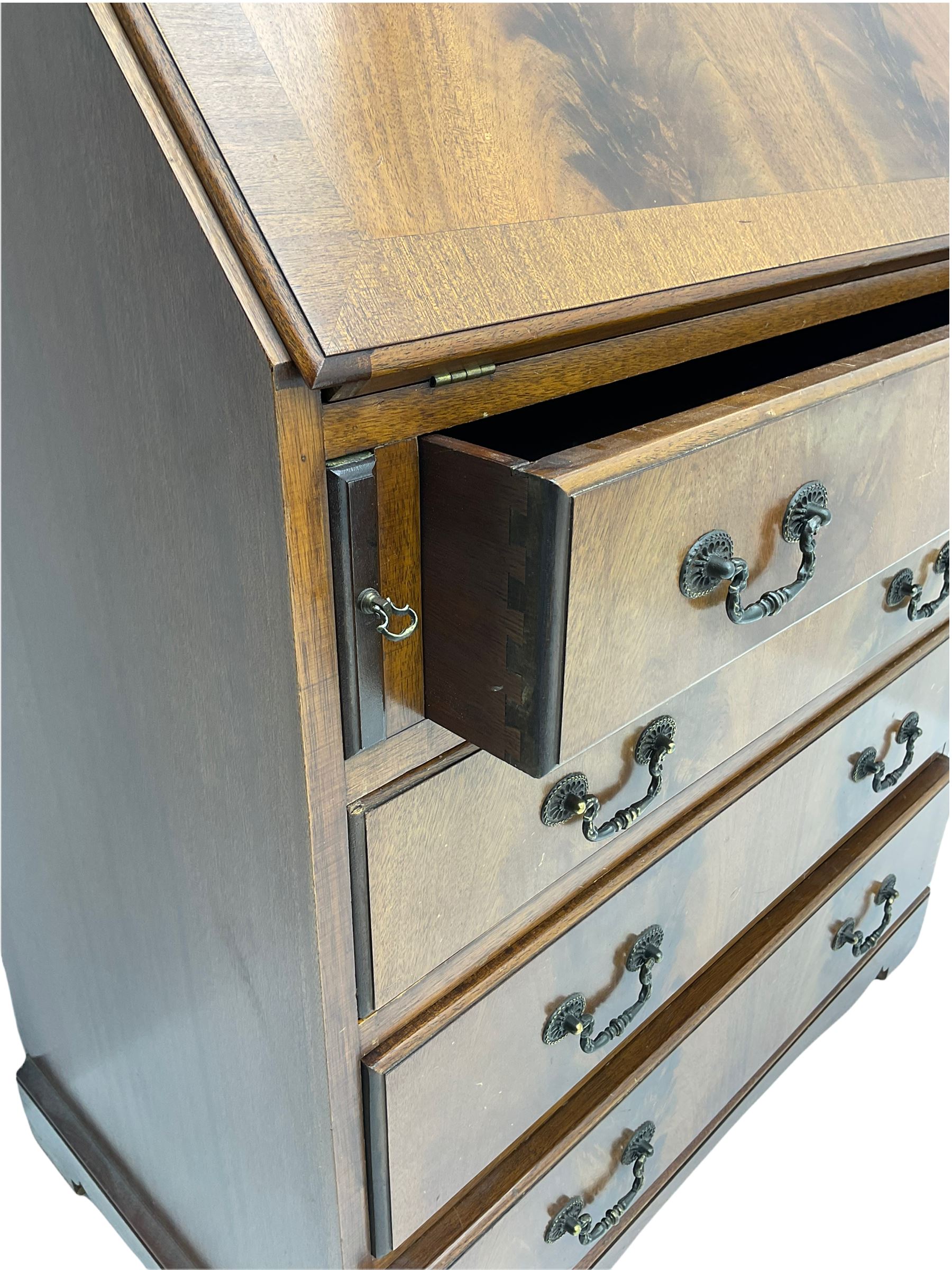 Reproduction mahogany bureau bookcase, the glazed bookcase over fall front bureau fitted with four drawers, on bracket feet