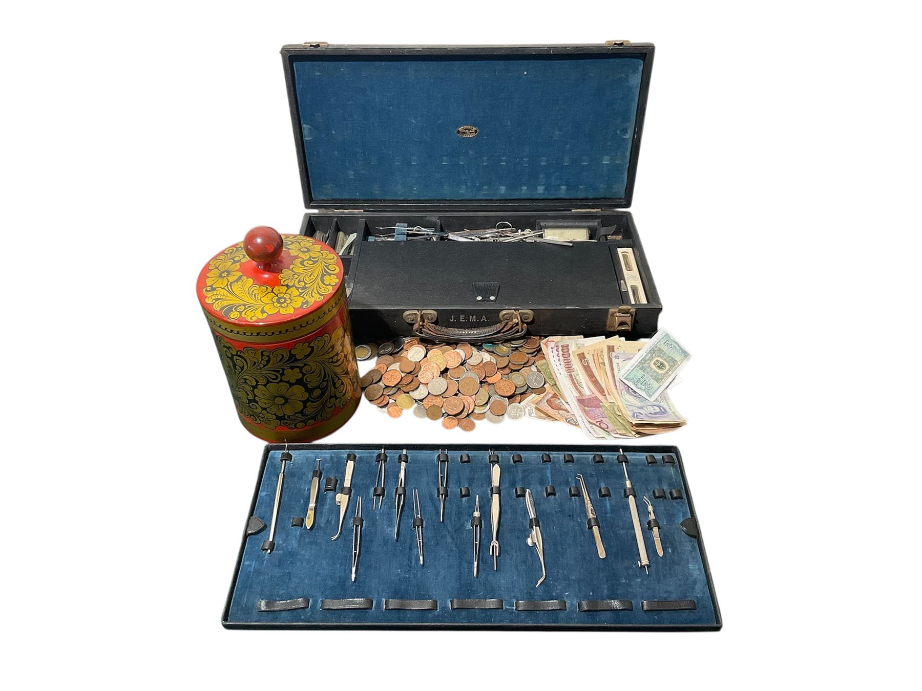 Large collection of continental coins and banknotes, in lacquered box, together with a box of eye instruments