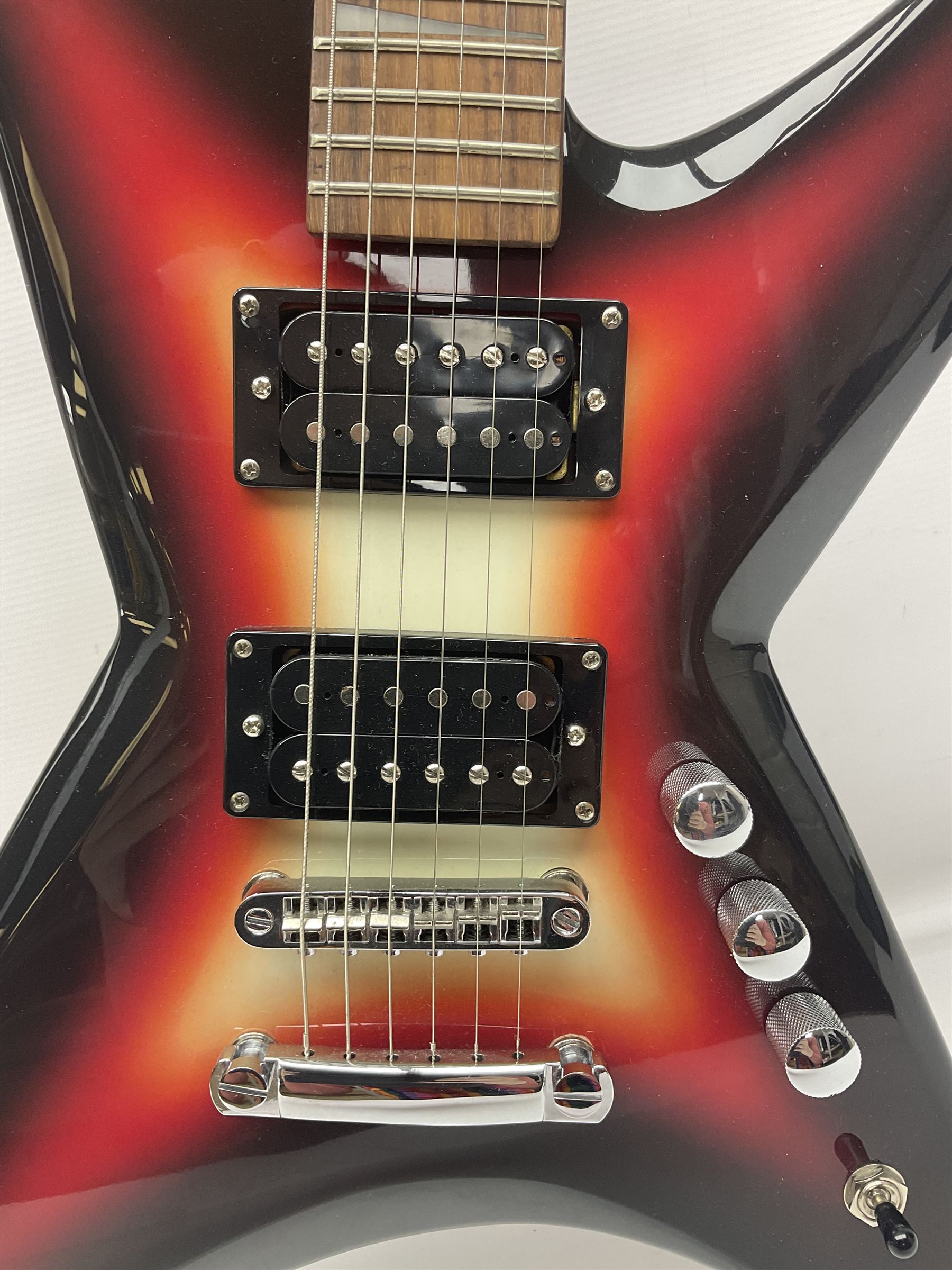 Jaxville X-Factor six-string electric guitar with three-tone X-shaped body L116cm overall.