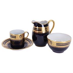 Limoges Coffee can and saucer, jug and open sucrier, all decorated with gilt boarder and decorated with bees framed with laurel leaves, with makers mark beneath