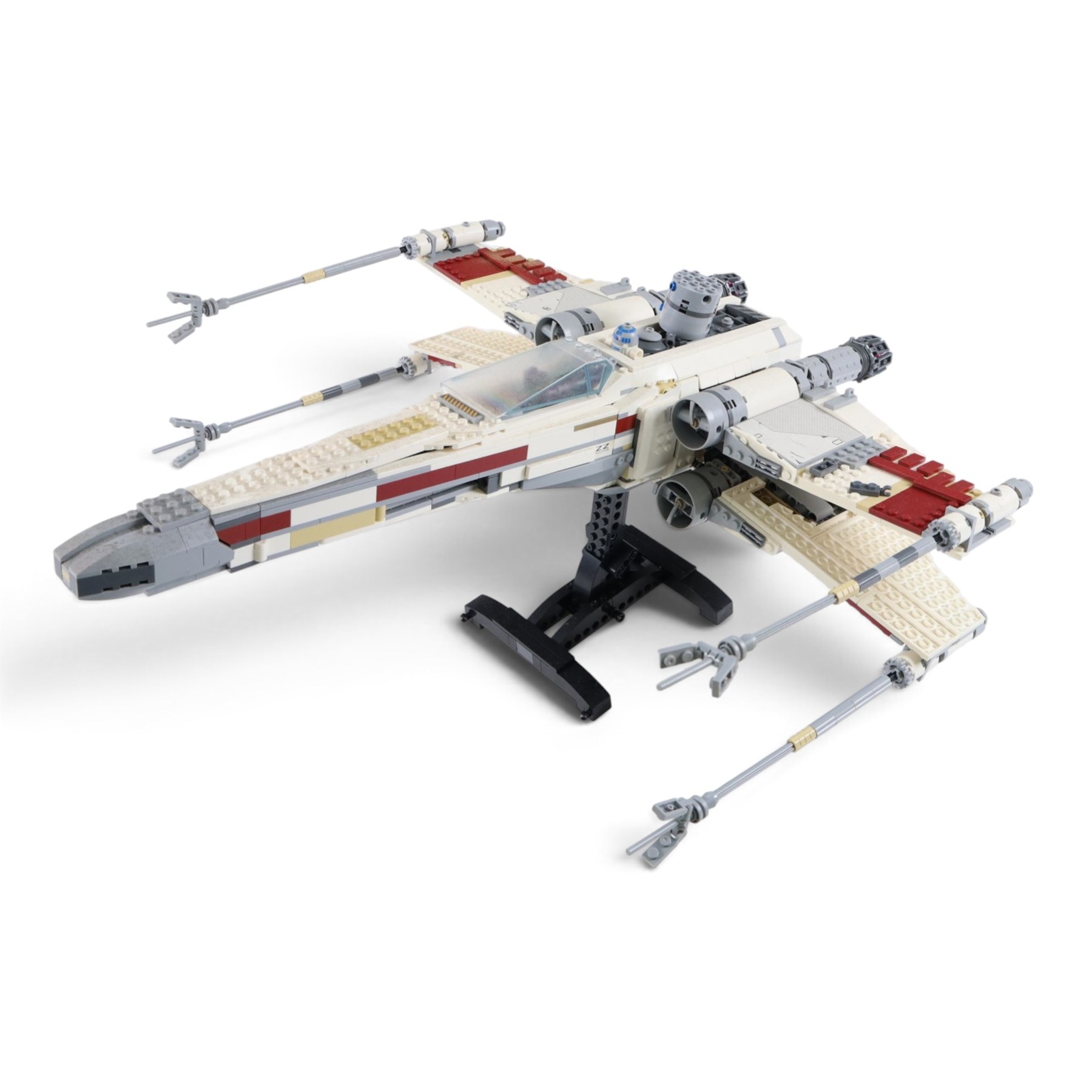 Three Lepin Star Wnrs built models, comprising Red Five X-Wing Starfighter no. 05039, Millennium Falcon no. 05132 and Super Star Destroyer no. 05028