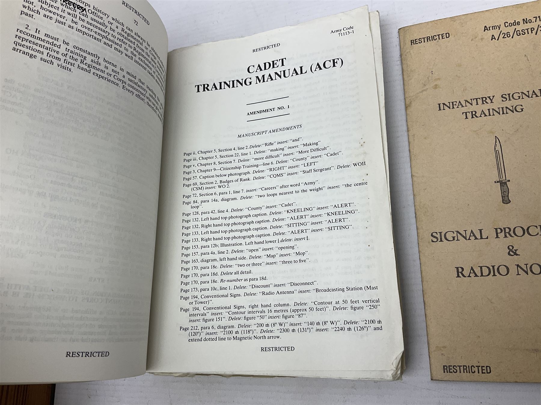 Collection of nineteen British Army booklets 1940s - 1970s including Small Arms Training 1944, various Infantry Training, Cadet Training Manual 1978, Signal Training, Commander's Aide Memoires etc; 1950s blue beret with Yorks Brigade badge; part travelling toilet set in cloth roll; all contained in pine box with webbing straps