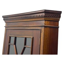 Late 20th century mahogany corner cabinet, dentil moulded cornice above a glazed door with astragal glazing enclosing two shelves, lower cupboard with fielded panel door and turned shell motif, on plinth base
