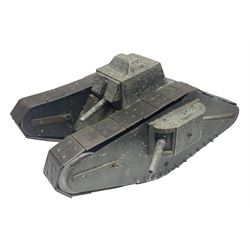 Large clockwork model of a WW1 Tank made of tin-plate and aluminium, with moving side cannons, the clockwork chain driven movement driving the articulated tin tracks; L28.5cms  W16.5cms and H13.5cms