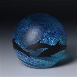 Malcolm Sutcliffe (British 1954-): Studio glass cameo bowl, the body mottled and speckled with shades of blue decorated with dolphins, etched signature, D18cm and matching paperweight (2)