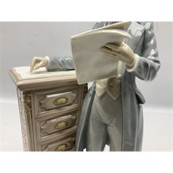 Lladro figure, Attorney, modelled as a man leaning against draws, no 5213, sculpted by Salvador Furio with original box, year issued 1984, year retired 1997, H35cm