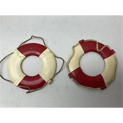 Thirteen P&O model life rings, referencing cargo and passenger ships, to include M.V Cannahore, Canberra, S.S Orsova, M,V Strathconon etc, D14cm