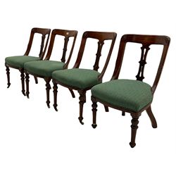 Set of four Victorian mahogany spoon back dining chairs, upholstered seats