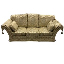 Steed Kedleston three seat sofa, and matching wing back armchair, upholstered in pale gold fabric