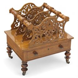 Victorian walnut Canterbury, scroll pierced divisions with turned carrying handles above a...