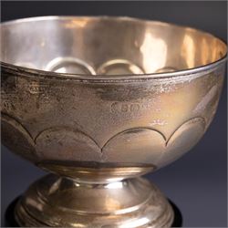 Edwardian silver pedestal bowl, of part fluted circular form, hallmarked Birmingham 1909, maker's marked worn and indistinct, upon an ebonised wooden pedestal, bowl H11.5cm