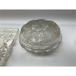 Glass dressing table tray, scent bottles and lidded bowl, metal mounted foliate design hair brushes and handheld mirrors etc