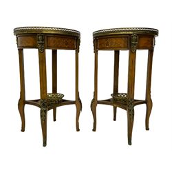 Pair late 20th century French style walnut circular hallway tables or plant stands, the top with pierced gilt metal gallery inlaid with flower heads and interlacing scrolls, each fitted with single drawer, the supports joined by undertier mounted with gilt metal plant basket, cast gilt metal mounts and fittings