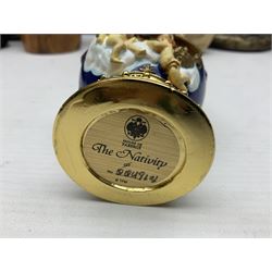 Franklin Mint House of Faberge 'The Nativity' ceramic egg, together with a Russian doll decorated with nativity scenes, Cinque Ports Pottery monk salt and pepper shaker and other monk figures, etc