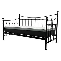 Contemporary Victorian revival black metal day bed, featuring arched back and sides with turned finials and spindle rails, complete with single 'OTTO' mattress