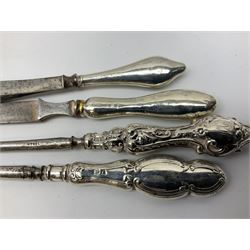 1920's silver stand, hallmarked Birmingham 1922, together with two tall faceted clear glass dressing table jars with hallmarked silver covers, and cut glass vase with hallmarked silver mounted collar, and small group of silver handled accessories, including files, picks, etc., approximate total silver weight 58.8 grams