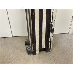 Folk art circus clown cabinet, the the two hinged doors with bow tie decoration opening to reveal fitted shelved interior, the body painted with polka dots and spades, H121cm